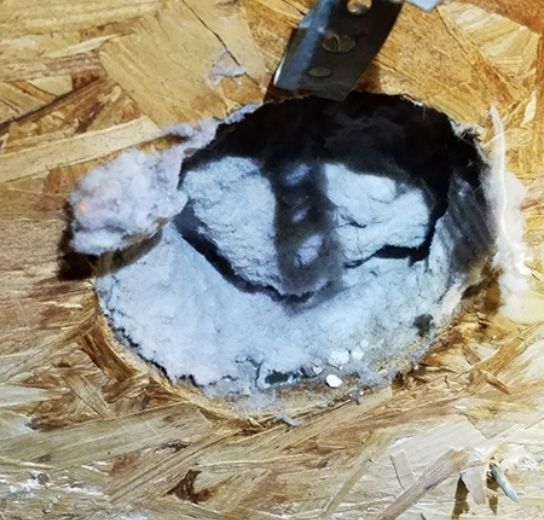 clogged dryer vent filled with lint